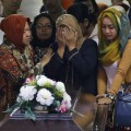 Surabaya, Indonesia – AirAsia Crash Search Officials Identified 1st Of 9 Bodies