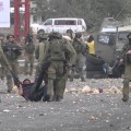 Undercover Israeli forces disguised as stone-throwers, arrest Palestinians