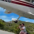 Wild video shows moment tourist clipped by plane