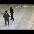 Video shows Palestinian give soldiers papers, then lunge with knife